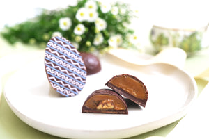 Easter chocolate candy bar egg filled with dulce de leche and pecan